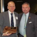 Michael McMenamin gives President’s award to Randy Swart